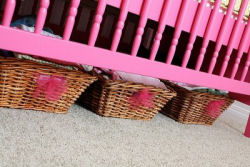 homemade baby nursery storage baskets decorated with hot pink tulle fabric