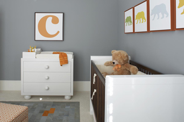 Bear themed baby nursery with gray walls and orange and white decorations