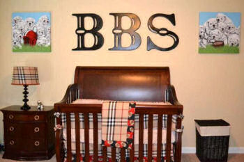 Masculine large wooden wall letters in a baby boy nursery room