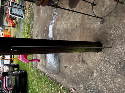 Metal crib rod from a pre-1980 Jenny Lind crib showing bent top attachment