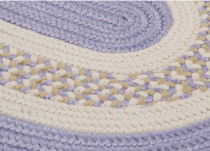 Lavender cream and sage green braided area rug for the baby nursery room