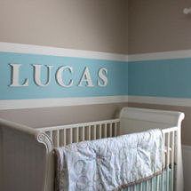 Light taupe baby blue and cream nursery wall paint colors used to paint stripes