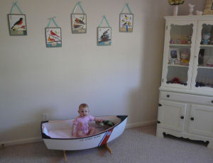 Shabby chic baby girl nursery room with sailboat decor