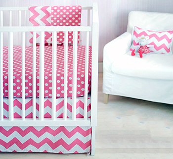 Modern hot pink baby girl bedding with  pink and white zig zag chevron fabric for the nursery