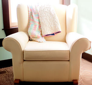 Neutral color upholstered nursery rocker glider