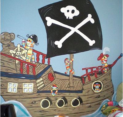 Pirate theme baby nursery wall mural painting in a sock monkey theme