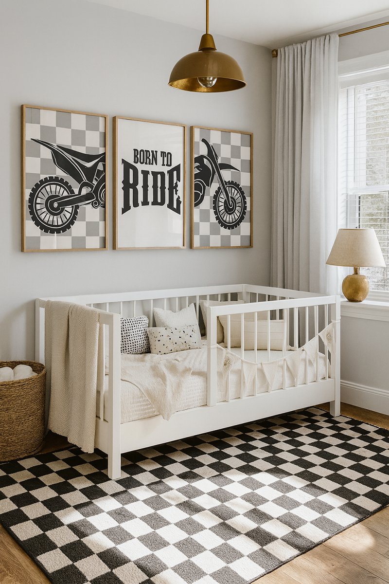 Motocross nursery with brass pendant light, white crib, checkered rug and dirt bike wall art