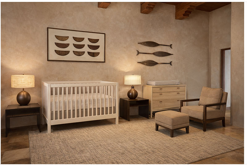Neutral nursery room layout showing three zones with crib, dresser changing area, and chair corner
