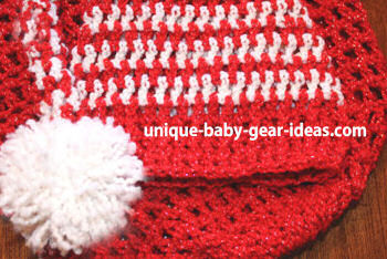 White and red Christmas baby crochet hat and cocoon set crocheted in sparkling red and white glitter yarn