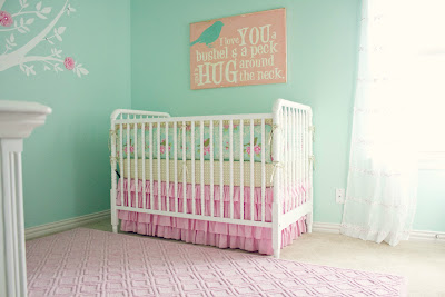 Mom's pink and aqua DIY nursery ideas plus help from loving family members = a baby girl's dream room!