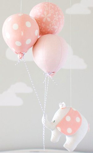 Homemade pink polka dots elephant baby mobile baby shower decorations.