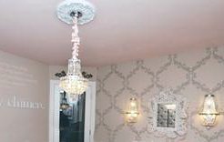 Elegant crystal nursery chandelier for a baby girl princess theme room with pink mini shades