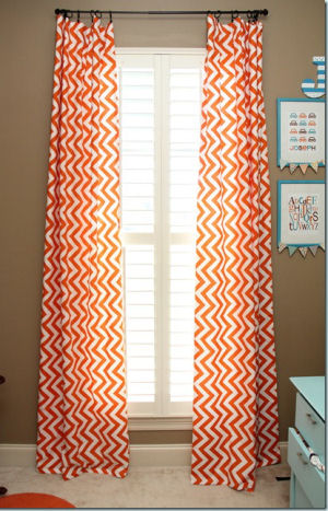 Orange and white chevon stripes baby nursery curtains in floor length panels