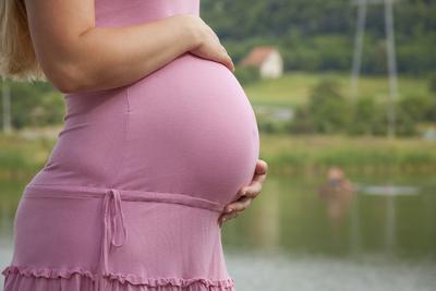 Pregnant Tummy Picture in Pink at 19 Weeks