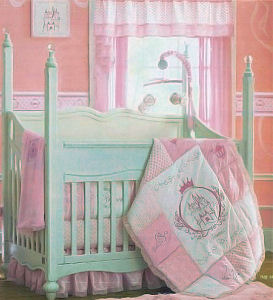 Elegant but affordable Disney princess bed with antique ivory and pink baby bedding set in a storybook fairy nursery.