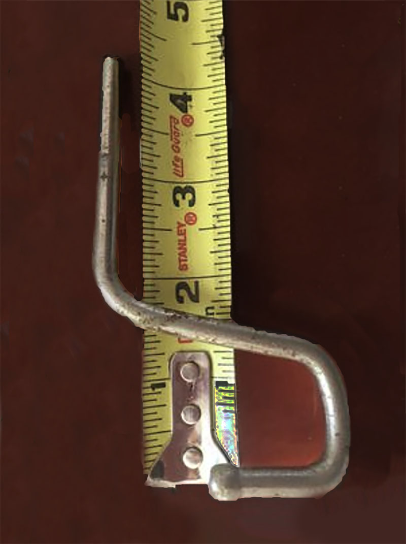 Close-up of an original vintage S15 crib spring hanger hook that is 4 inches long for a Childcraft baby crib and possibly others
