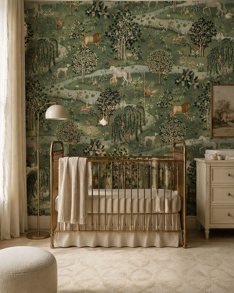 Close view of sage green nursery wallpaper with layered pattern and crib styling