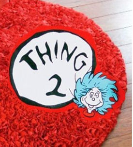 Red shag area rug for a Dr Seuss Thing One Thing Two or Cat in the Hat baby nursery theme