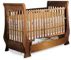 Wooden baby sleigh crib woodworking plans with drawer underneath the baby bed