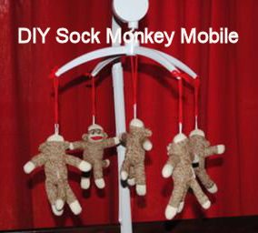 DIY sock monkey baby crib mobile for a nursery made with a kit