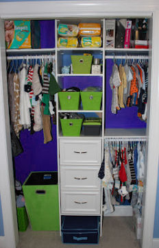 Baby boy's beautifully organized nursery closet in lime green, baby blue and white