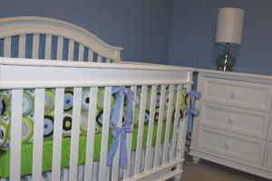 Modern lime green navy baby blue and white custom made baby crib bedding for a baby boy nursery room