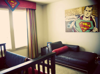 Cozy resting spot in the baby's super hero nursery