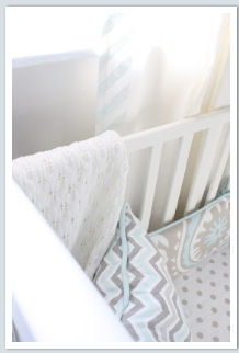 DIY painted nursery curtains in baby blue and white chevron stripes