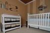 This baby boy nursery is an organized delight with his everyday items stored inside baskets with homemade liners in Pottery Barn style only better.