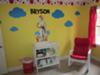 Our baby boy's name, blue cloud shaped wall decals, Cat in the Hat and Thing One and Thing Two are the focal point of the nursery over our baby boy's changing table.