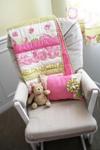 The Nursery Rock w Pooh Bear and the Baby's Pink and Green Crib Quilt Made by Mom