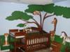 Jonas' safari nursery theme wall mural with paintings of a Giraffe, Zebra, Monkeys and a friendly lion and tiger or two!