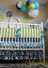 Paper Lanterns, Pom Poms and Polka Dots Custom Fabric Wall Decals Complement the Green and White Chevron Stripes and Black and White Damask Pattern of Amy's Baby Boy's Crib Bedding Set