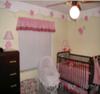 Pastel Yellow and Pink Nursery Decor with Flowers and Ladybugs