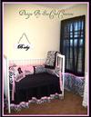 Custom silky pink black and white baby girl nursery room decorated in chenille and zebra pattern fabric 