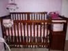 Our baby girl's crib and elegant pink and brown damask pattern baby bedding set