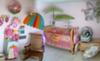 Surfer Girl Nursery Theme w pink and orange surf baby bedding and decor.
