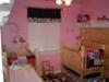 Pretty Pink Rustic Cowgirl Nursery for Twin Girls with Cow Print Crib Quilts and Baby Bedding