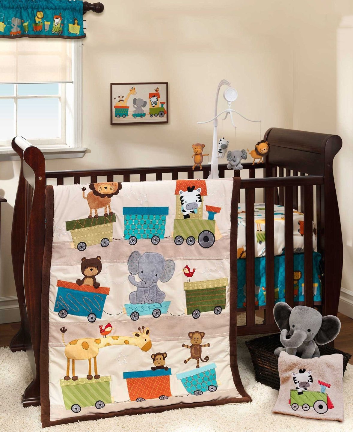 Baby circus animals train theme baby bedding for the crib with matching decor.