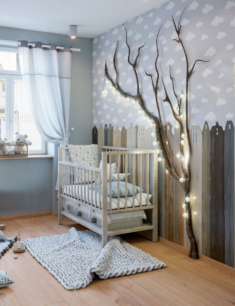 Cloud themed baby room for a boy with a 3d tree and cityscape wall mural