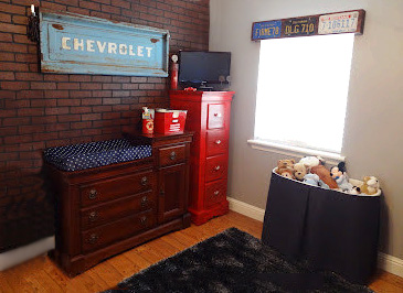 Classic vintage car themed baby nursery for a boy with antique Chevrolet truck memorabilia collectibles DIY decor