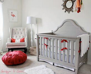 Elegant Florida theme nursery room decorated for a baby girl with coral pink flamingos